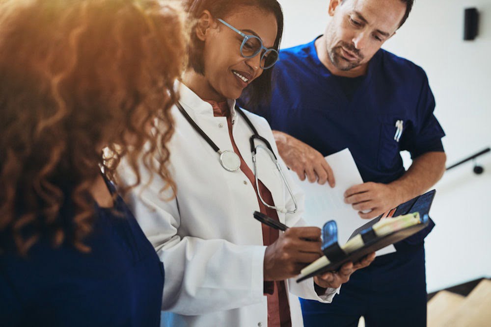 Professionals reviewing drug and alcohol addiction recovery options
