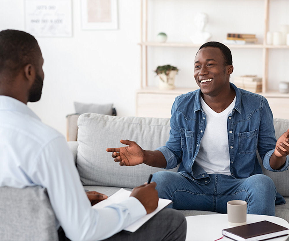 Man in individual therapy learning proper money management in recovery