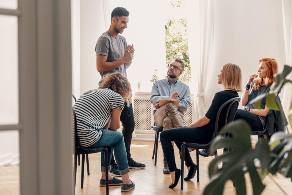 Group Discussing Core Values to Guide Addiction Recovery
