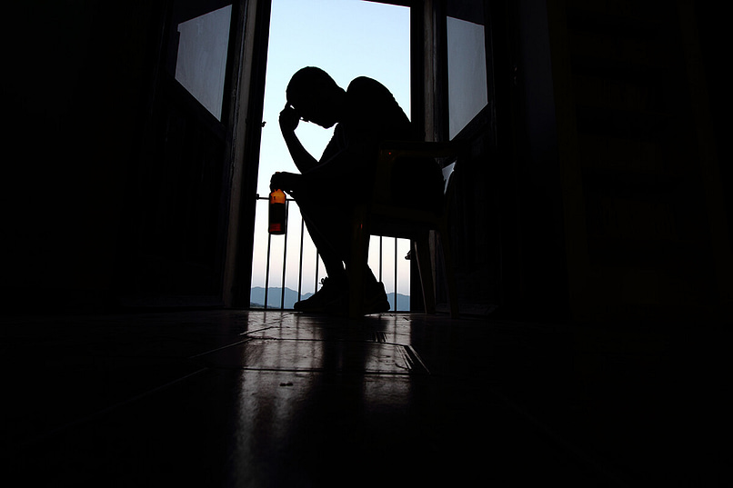 A man suffering from drug and alcohol dependence