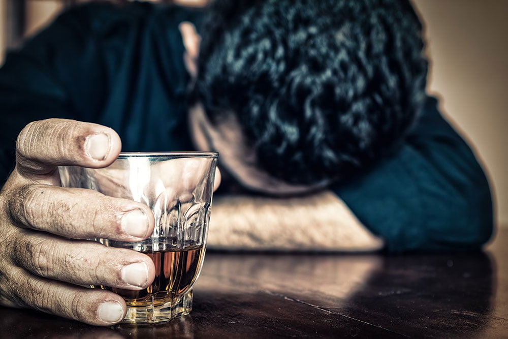 man struggling with alcohol addiction -step 1 aa