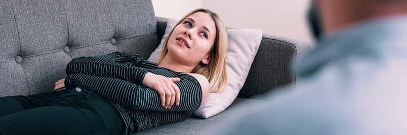 Patient Lying Down on a Couch Listening About the Risks of Alcohol-Induced Seizures