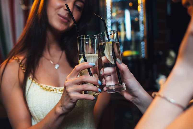 girls enjoy mocktails in alcohol recovery group