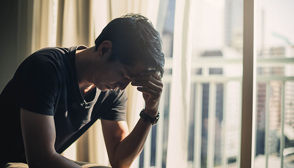 depressed man experiencing changes in his personality