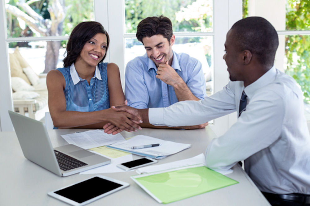 happy individuals celebrating getting hired
