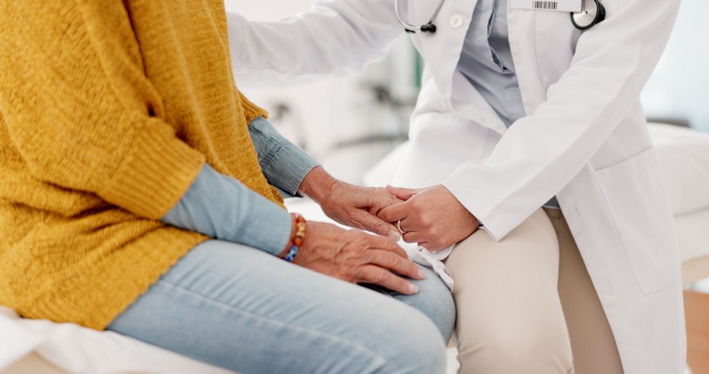 Medical professional supporting elderly patient, Oregon fentanyl emergency
