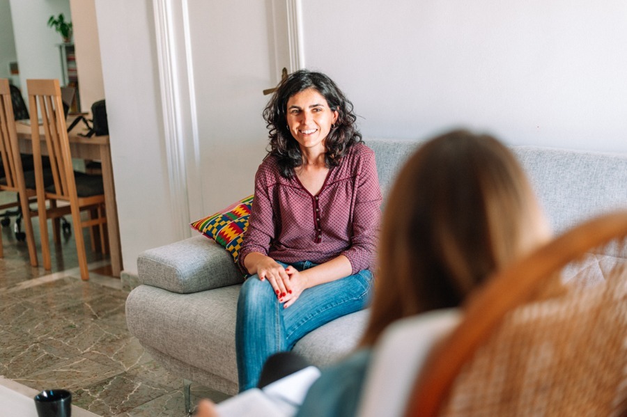 Professional therapist assisting a patient while discussing how alcohol can thin the blood