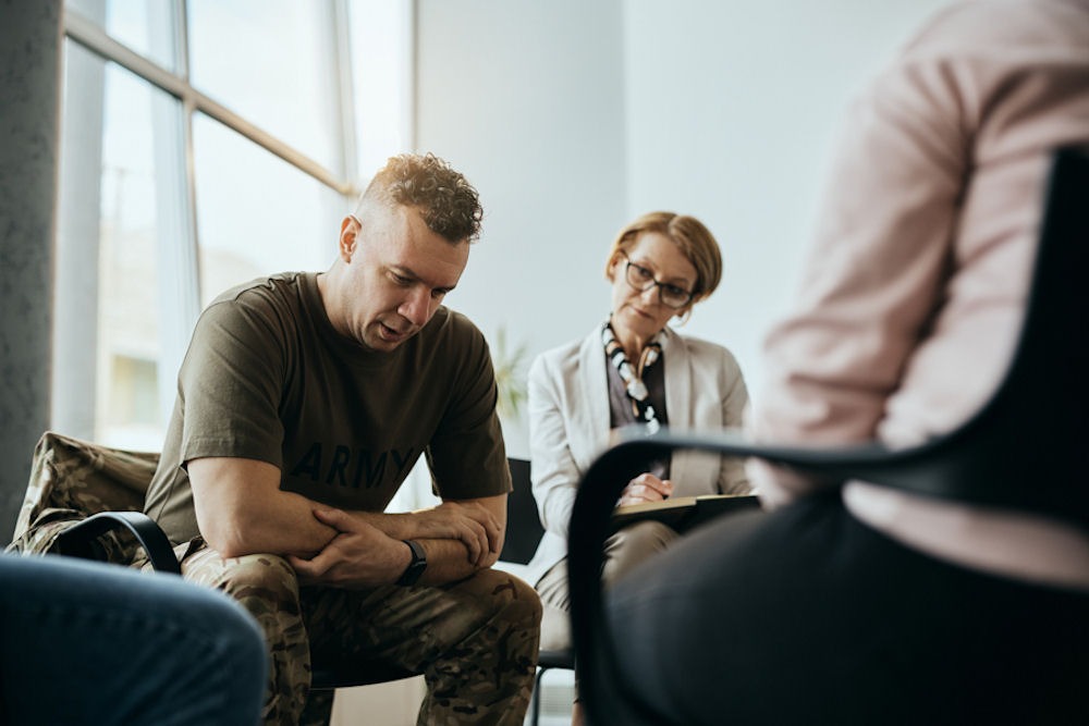 Man in group therapy reflecting on whether crack and meth are the same thing