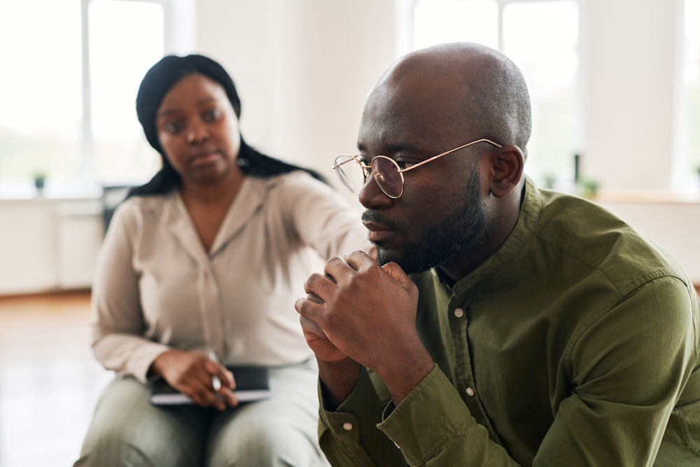 A man listening to the Sublocade injection process