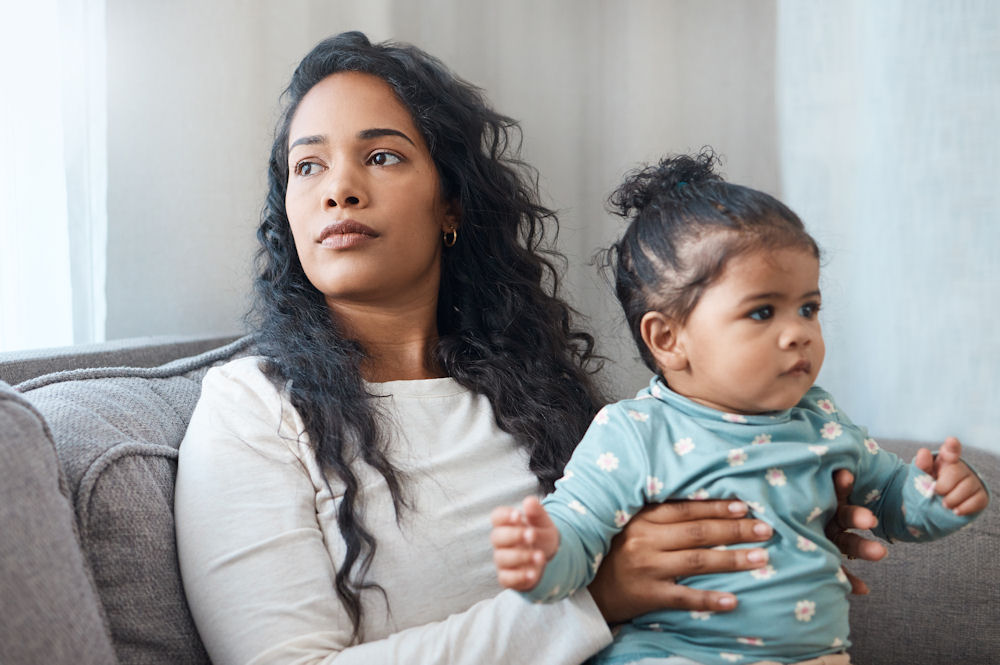 Woman with postpartum depression in therapy session