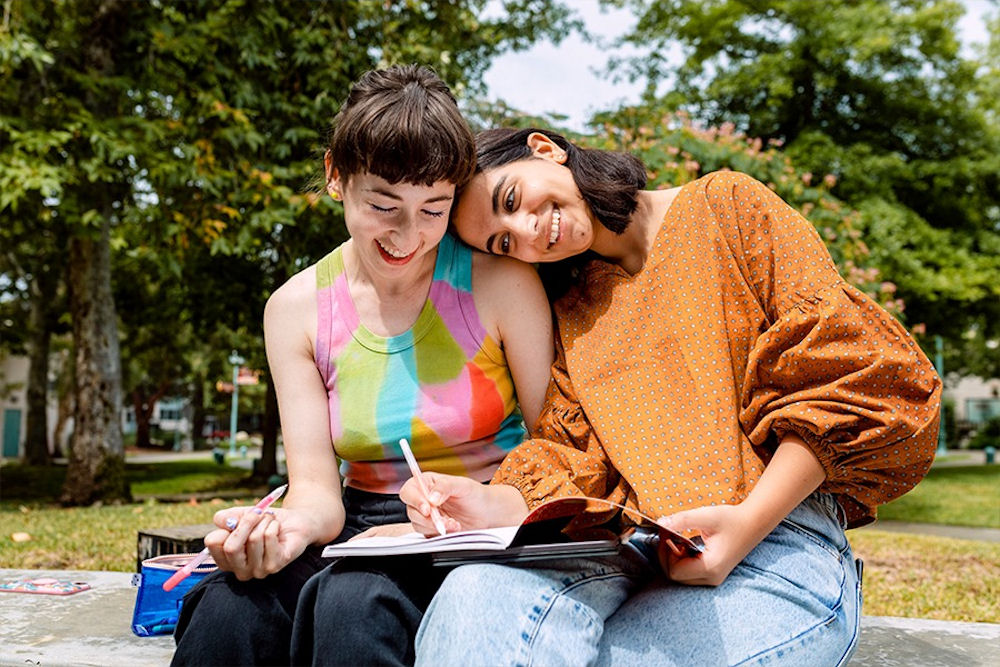 two women celebrating lgbtq pride month