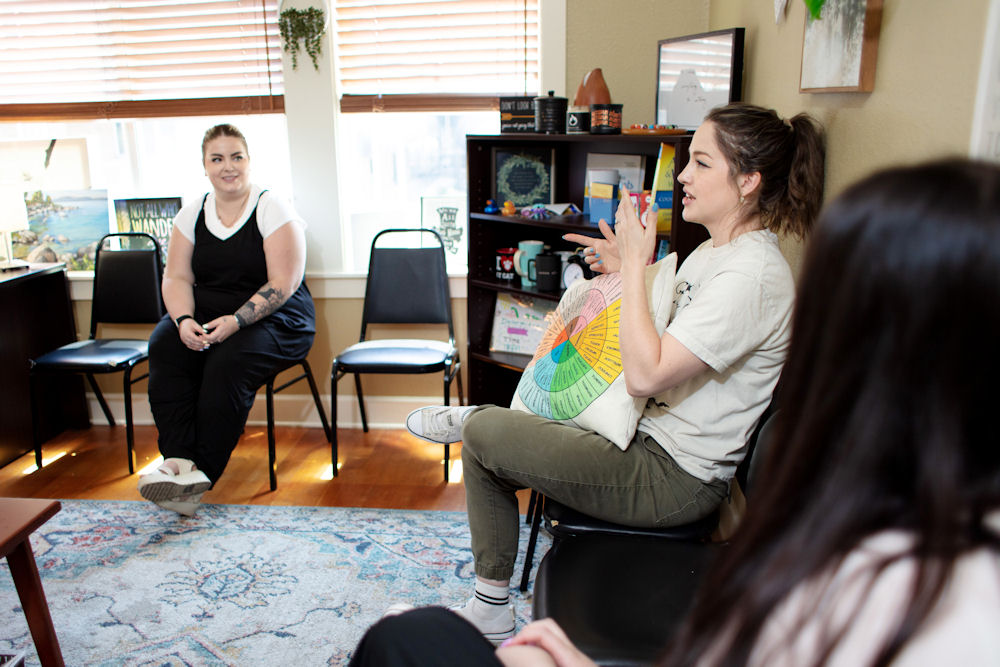 Group therapy session in PHP addiction treatment
