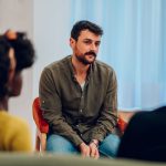 man in group to work on sobriety