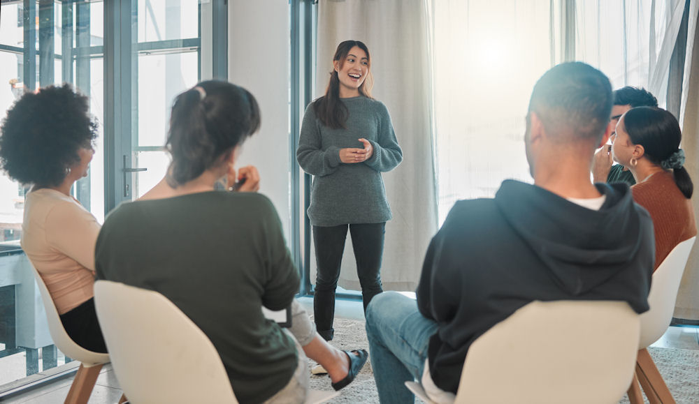 a woman smiling in therapy session